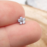 Titanium clear CZ flower implant earrings by Body Clickers, 20g, with detailed flower design and secure implant style.
