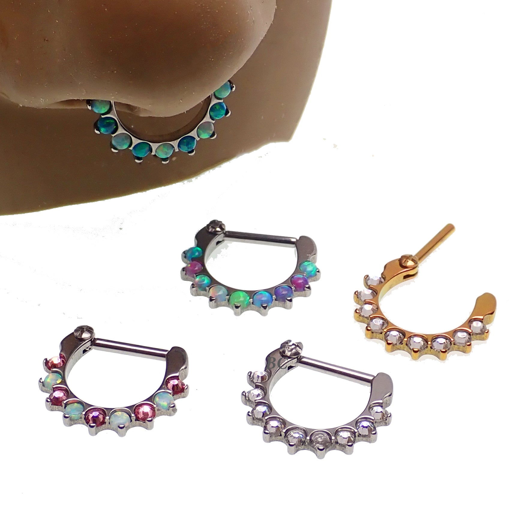 Pink CZ and opal-lined stainless steel clicker earrings for body piercing, 16g from Body Clickers.