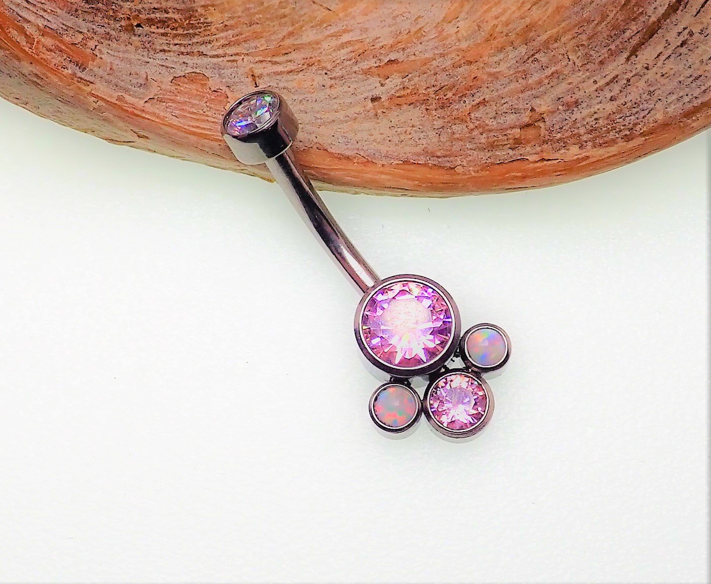 Titanium opal and Swarovski crystal belly ring by Body Clickers, featuring a sparkling design on a sleek metal band.