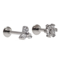 Two-piece set of clear CZ Trinity and flower titanium flatback earrings in 14g, 16g, and 18g for piercings.