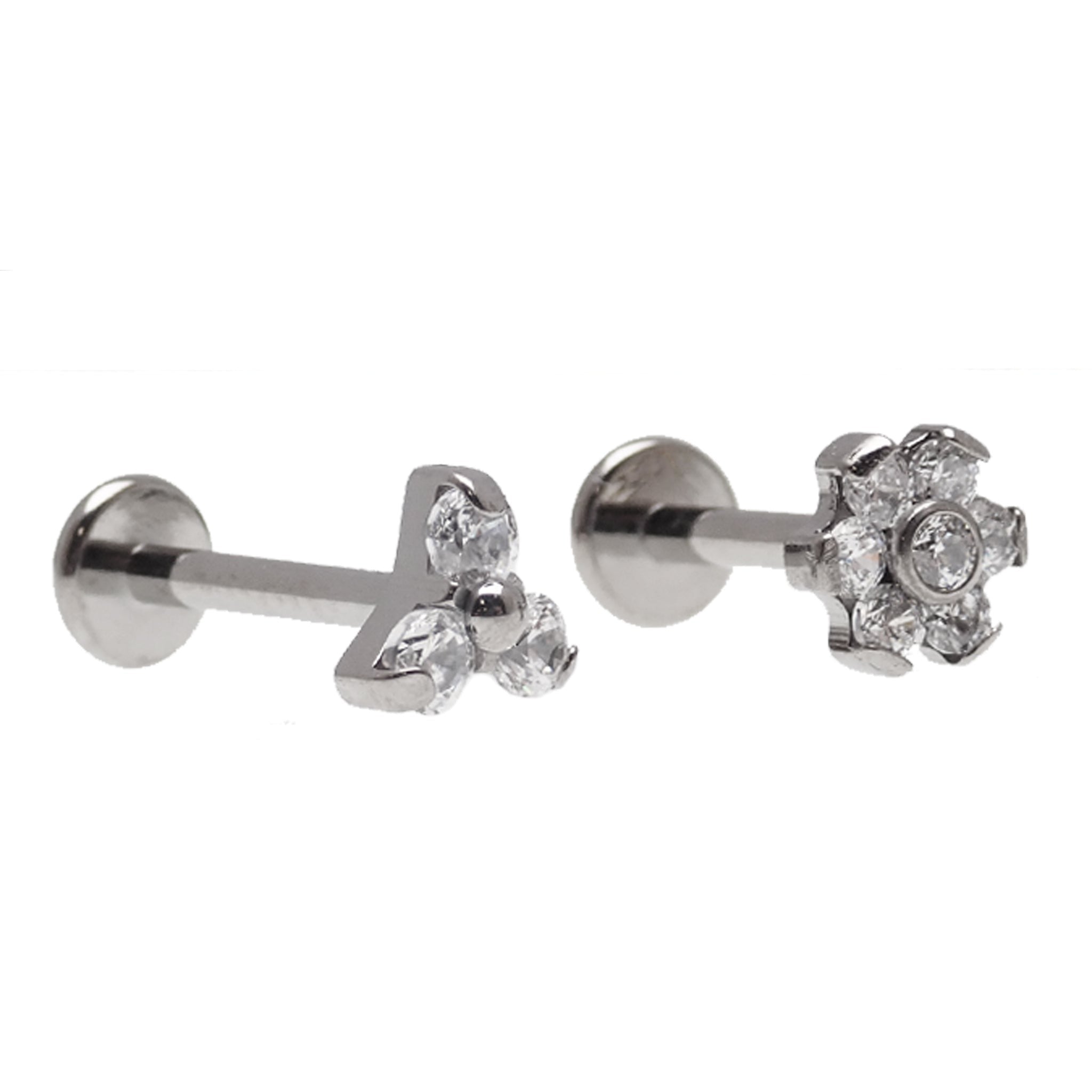 Two-piece set of clear CZ Trinity and flower titanium flatback earrings in 14g, 16g, and 18g for piercings.