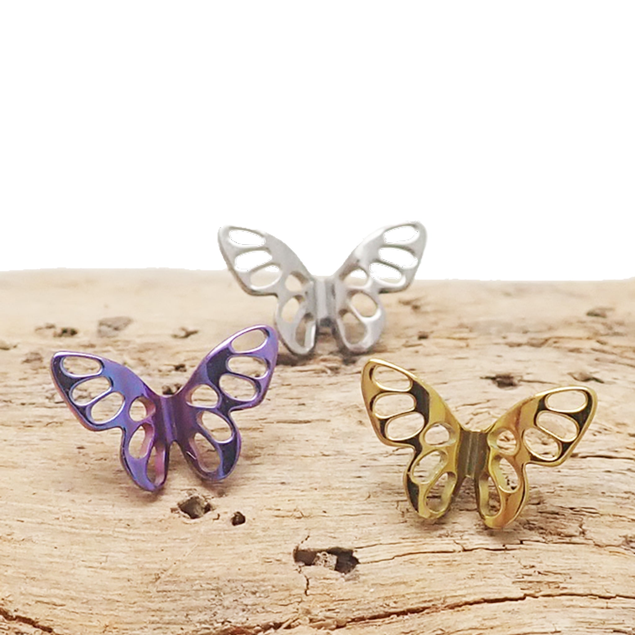 Butterfly titanium flatback piercing earrings in 14g, 16g, and 18g sizes, featuring a sleek, lightweight design by Body Clickers.