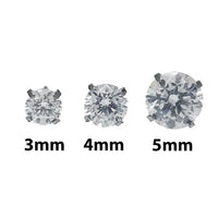 Pair of clear CZ crystal push-fit titanium earrings in 14g to 20g with 2.5mm gems, designed for body clicker piercing.