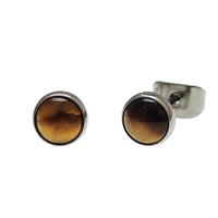 Pair of Tiger's Eye titanium earrings from Body Clickers with polished, oval gemstone beads on sleek metal hooks.