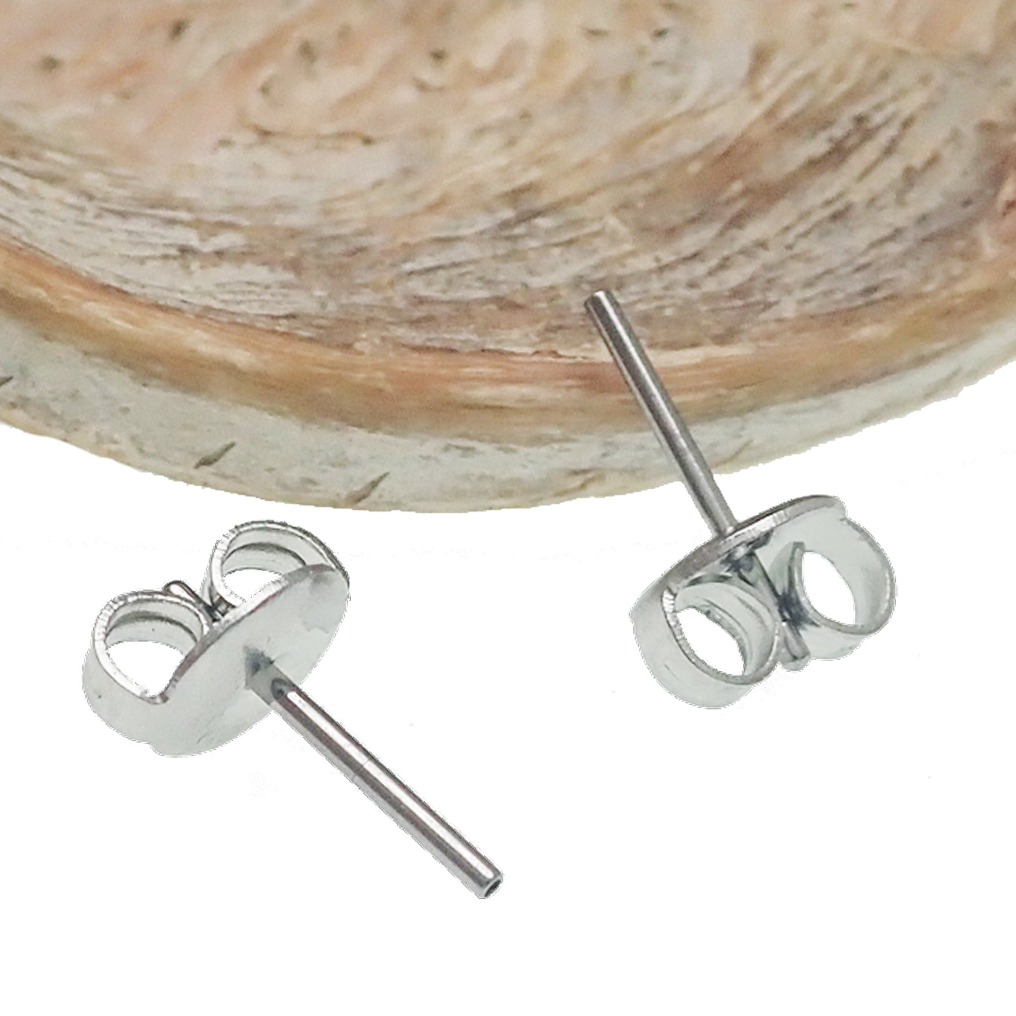 Pair of Body Clickers threadless earring backs for 20g earrings, designed to fit push-fit tops, shown on a white background.