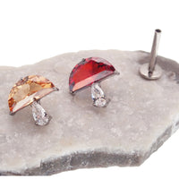 Body Clickers titanium flat back helix earrings with champagne mushroom CZ in 14g, 16g, and 18g sizes, featuring flat back design.