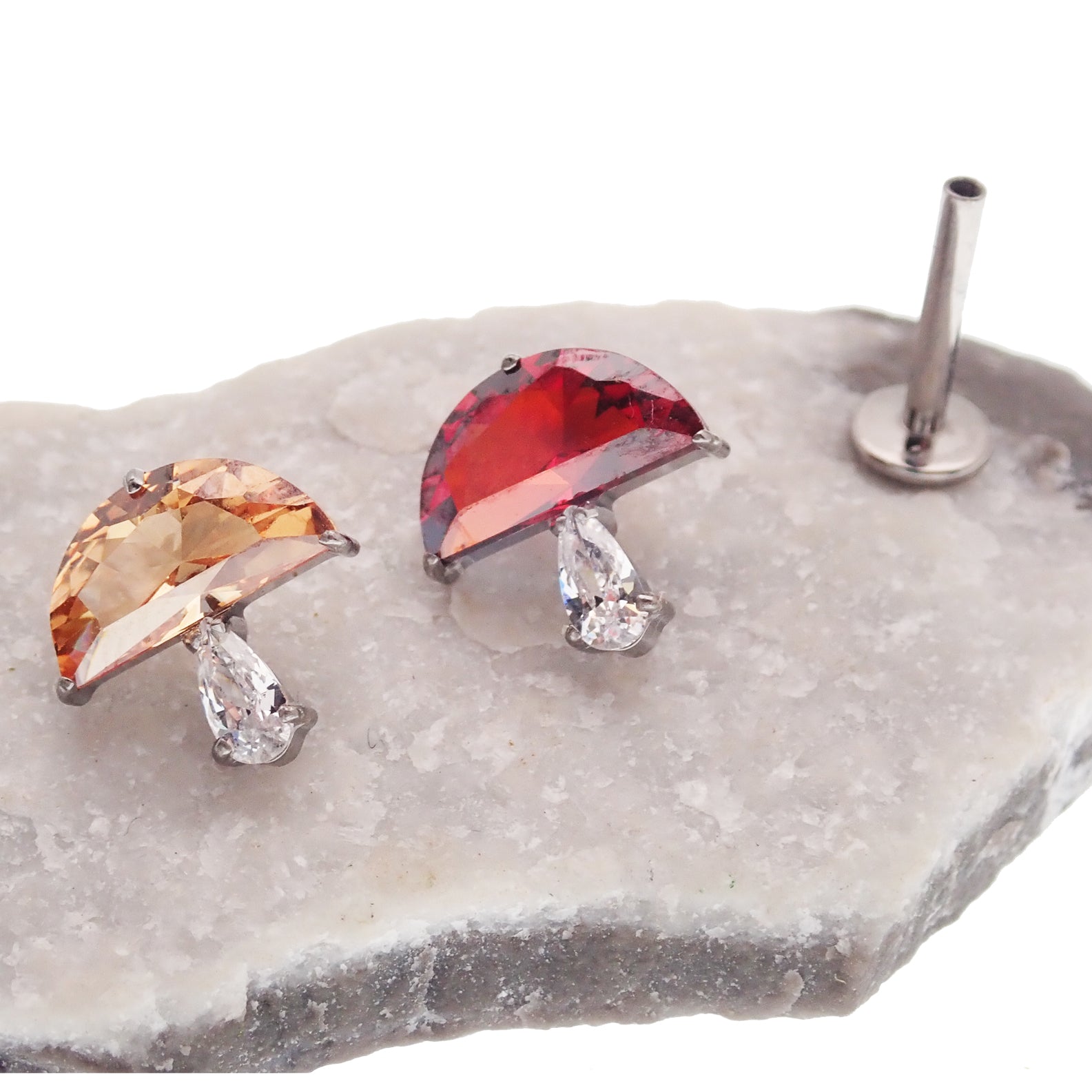 Body Clickers titanium flat back helix earrings with champagne mushroom CZ in 14g, 16g, and 18g sizes, featuring flat back design.