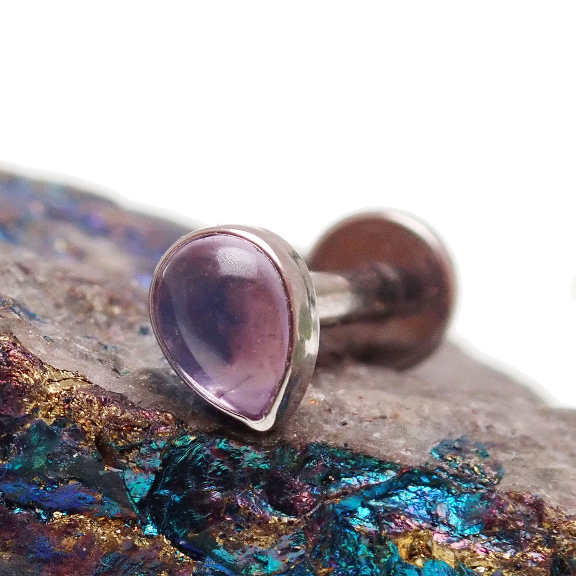 Titanium amethyst tear drop flat back labret piercing by Body Clickers, 18G, 1mm thickness, 6mm length, smooth and polished.