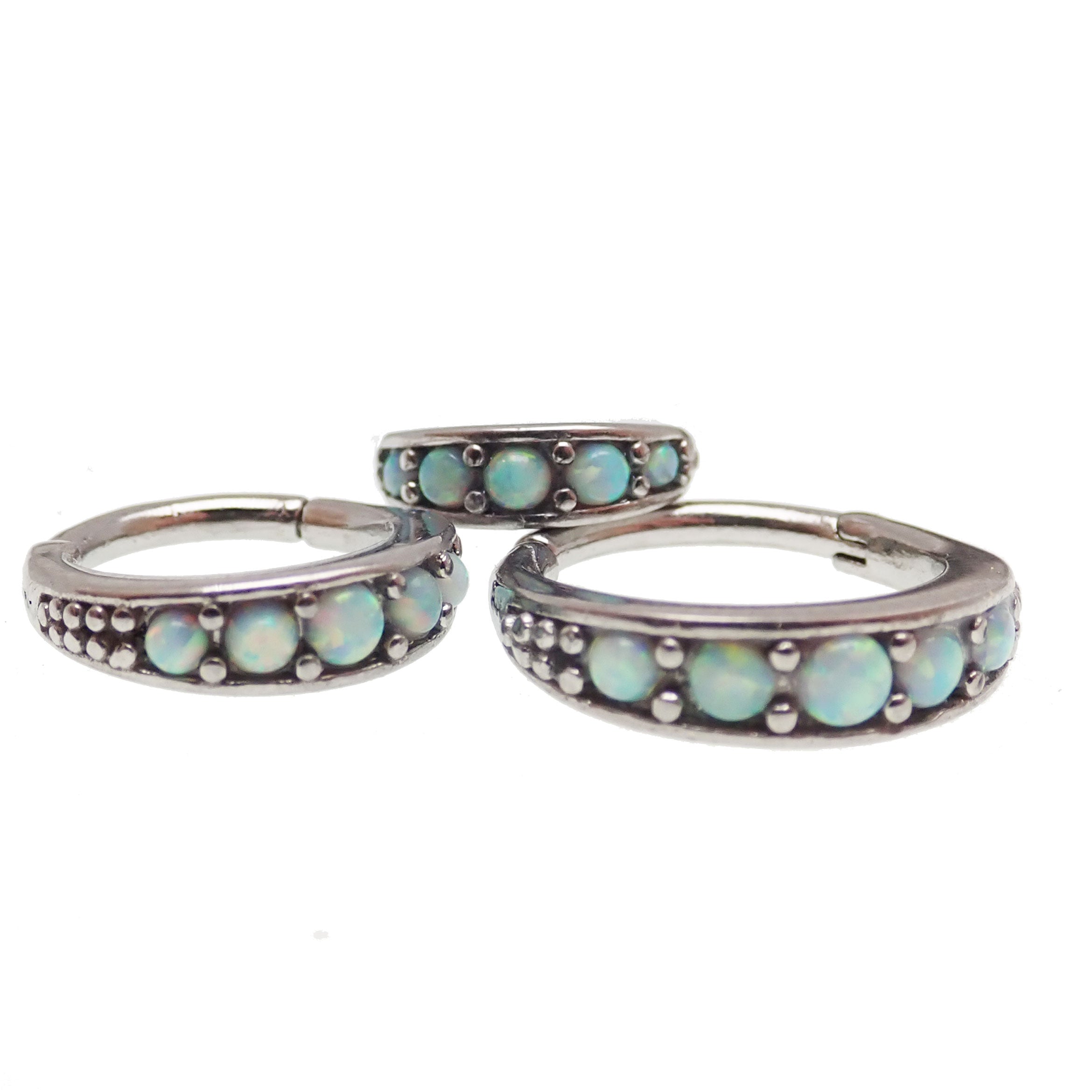 Hinged surgical steel clicker with opal beadwork, Body Clickers brand, featuring 6mm beads for ear or cartilage piercing.