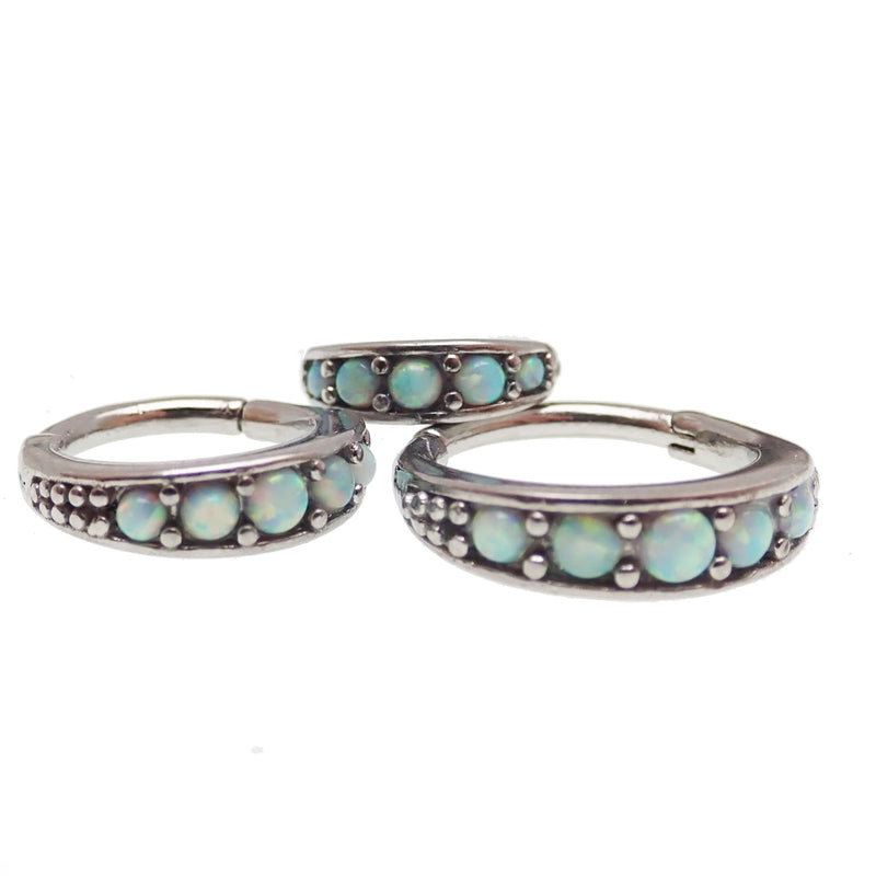 Hinged surgical steel clicker with opal beadwork, Body Clickers brand, featuring 6mm beads for ear or cartilage piercing.