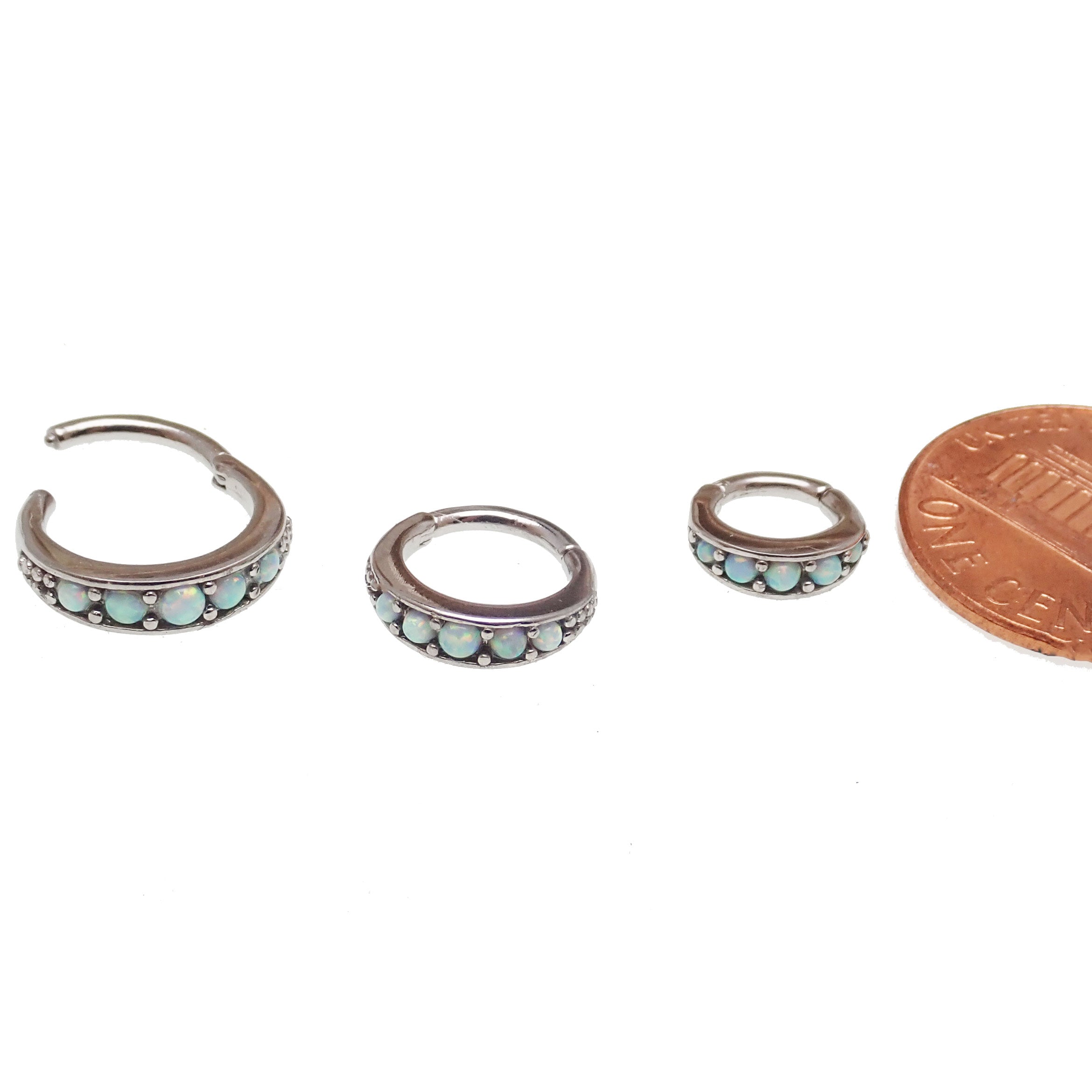 Surgical steel hinged clicker with white opal beadwork, designed for body piercing jewelry by Body Clickers.