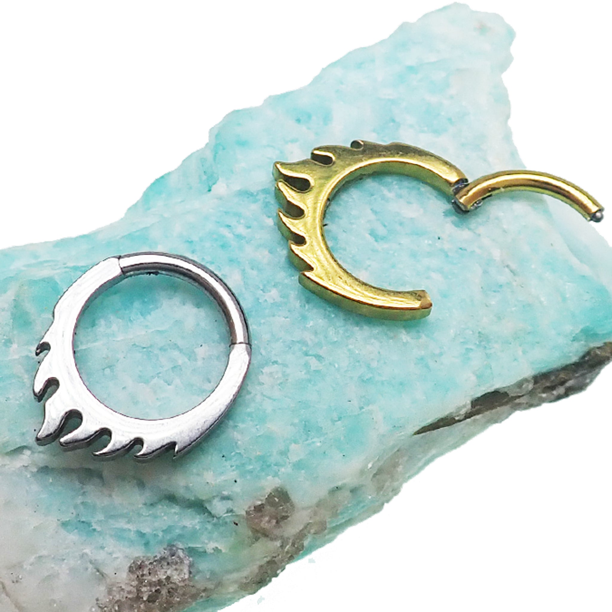 Flaming Fire Titanium Hinged Clicker 16g for body piercing, made by Body Clickers, with fiery orange and red flame design.