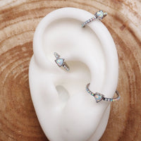 Titanium Heart Opal Hinged Clicker earring in 16g, from Body Clickers, featuring a heart-shaped opal gemstone and secure clasp.