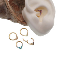 Gold titanium hinged clicker earring with CZ stones, 16g body jewelry for septum or daith piercings, by Body Clickers.