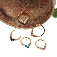 Gold titanium hinged clicker earring with CZ embellishments, designed for septum or daith piercings, by Body Clickers.