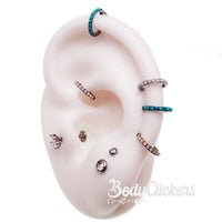 Hinged clicker earring with blue opal inlay, 6mm size, Body Clickers brand, 16g gauge, showcasing the jewelry's design and materials.