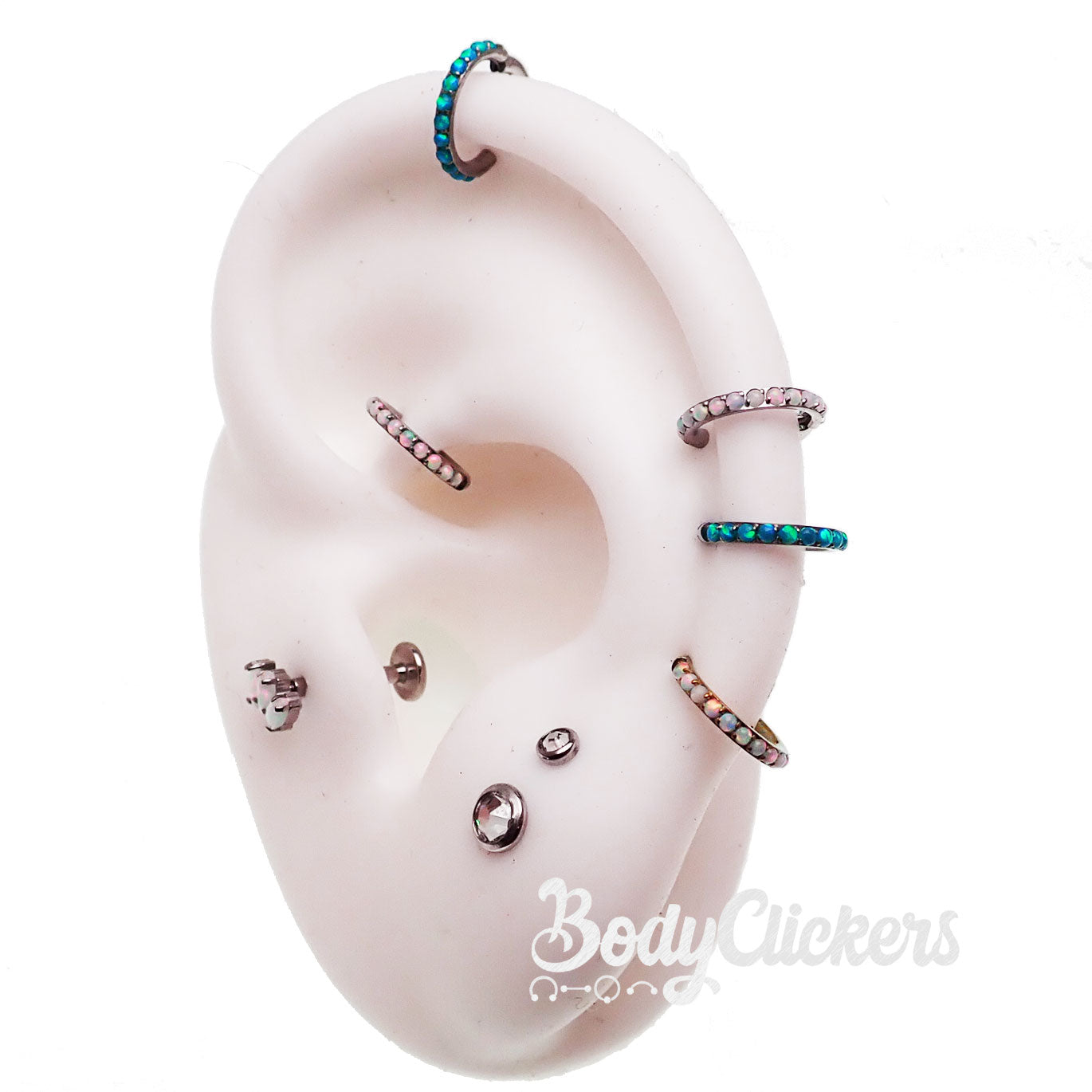 Hinged clicker earring with blue opal inlay, 6mm size, Body Clickers brand, 16g gauge, showcasing the jewelry's design and materials.