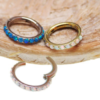 Blue opal inlaid hinged clicker earring with 6mm size and 16g body clickers design for cartilage or body piercing.