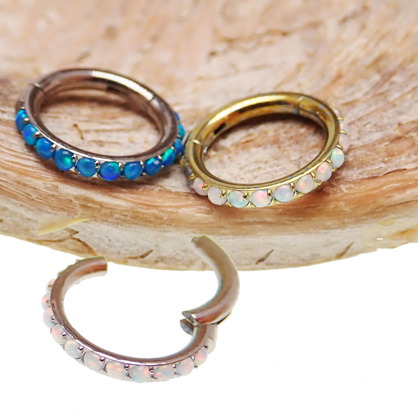 Blue opal inlaid hinged clicker earring with 6mm size and 16g body clickers design for cartilage or body piercing.