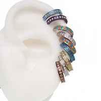 Huggie-style 10mm titanium hinged clicker earring by Body Clickers, featuring a bubblegum opal design in 16g size.