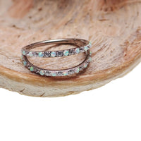 Opal and CZ spread titanium hoop earring by Body Clickers, hinged clicker style, 16g with colorful gemstone accents.