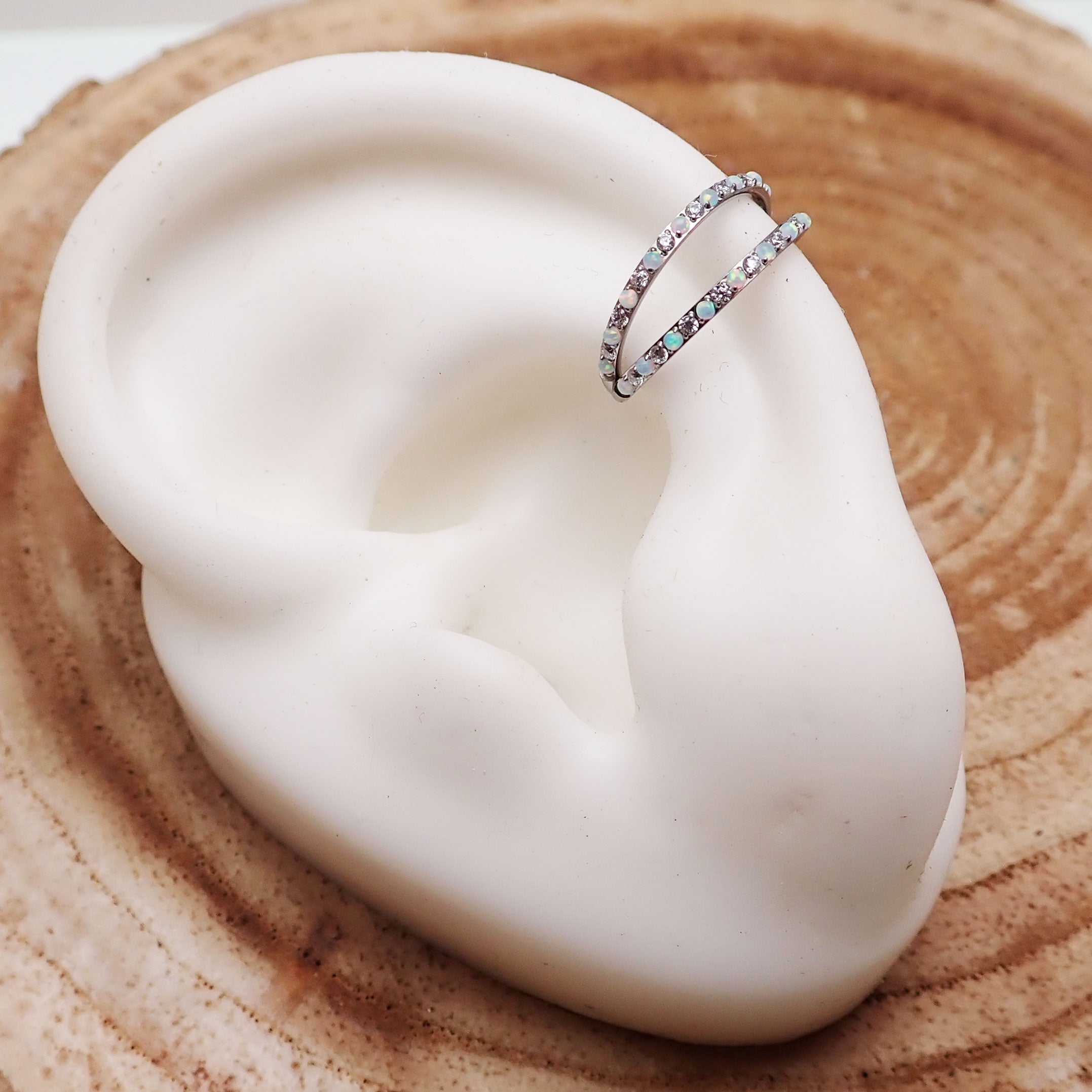 Opal and CZ spread titanium hoop earring with hinged clicker design in 16g by Body Clickers