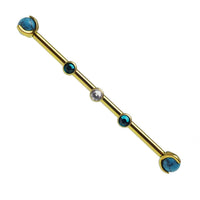 Turquoise and zircon titanium industrial piercing in 14g with a sleek 32mm bar, featuring vibrant turquoise stones and durable titanium.