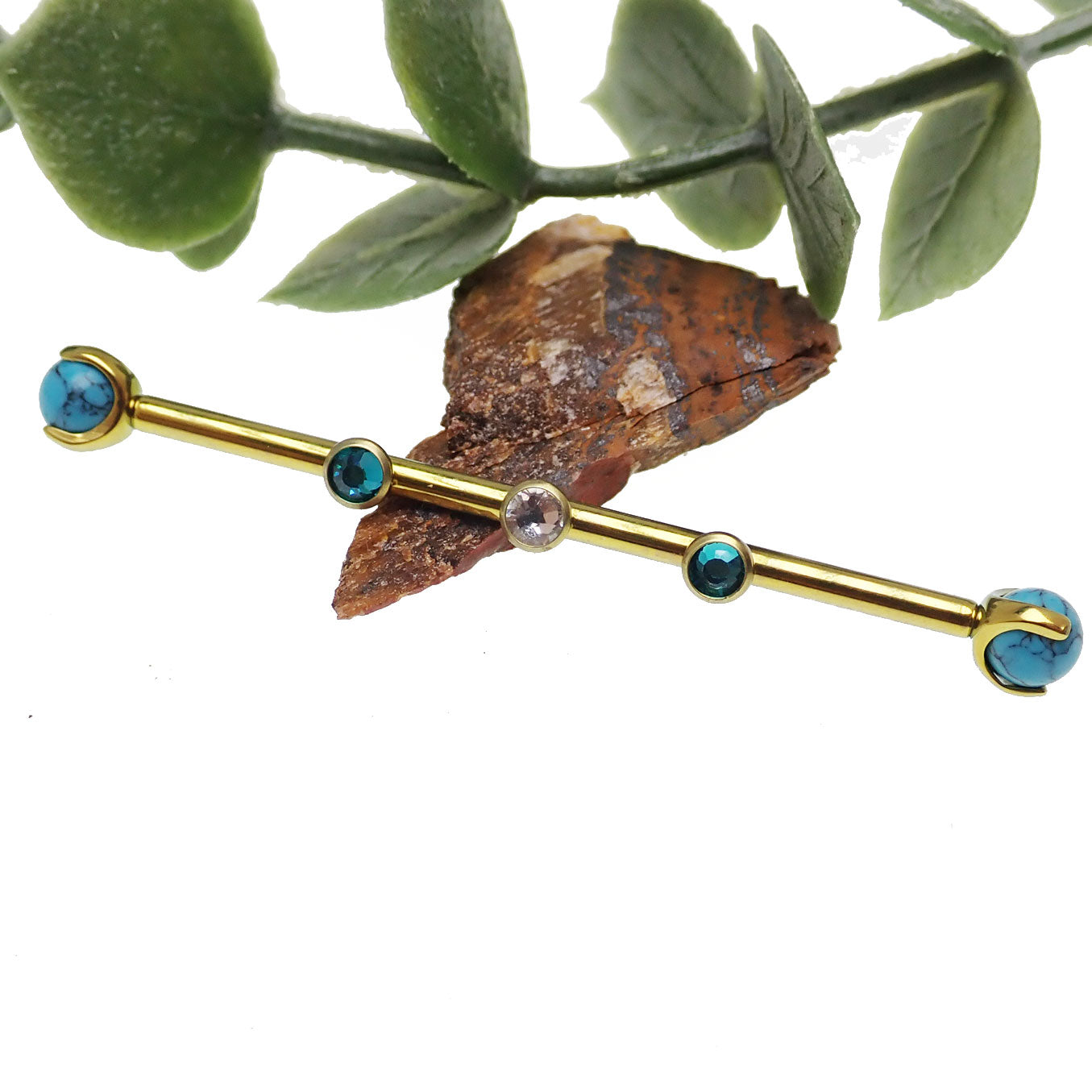 Turquoise and zircon titanium industrial piercing in 14g with a 32mm length, featuring a sleek industrial barbell.