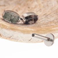 Semi-precious moss agate oval titanium flatback piercing by Body Clickers, internally threaded, 18g, 6mm size.