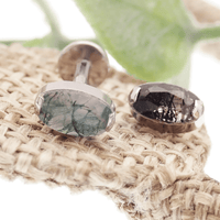 Semi-precious oval moss agate titanium flatback piercing by Body Clickers, internally threaded, 18g, 6mm size.