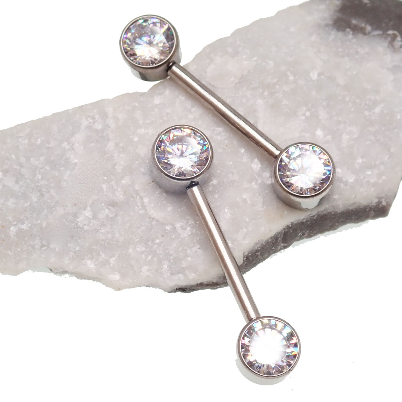 Titanium push-fit nipple piercing jewelry with cubic zirconia accents from Body Clickers, 12 gauge, 5mm to 12mm length.