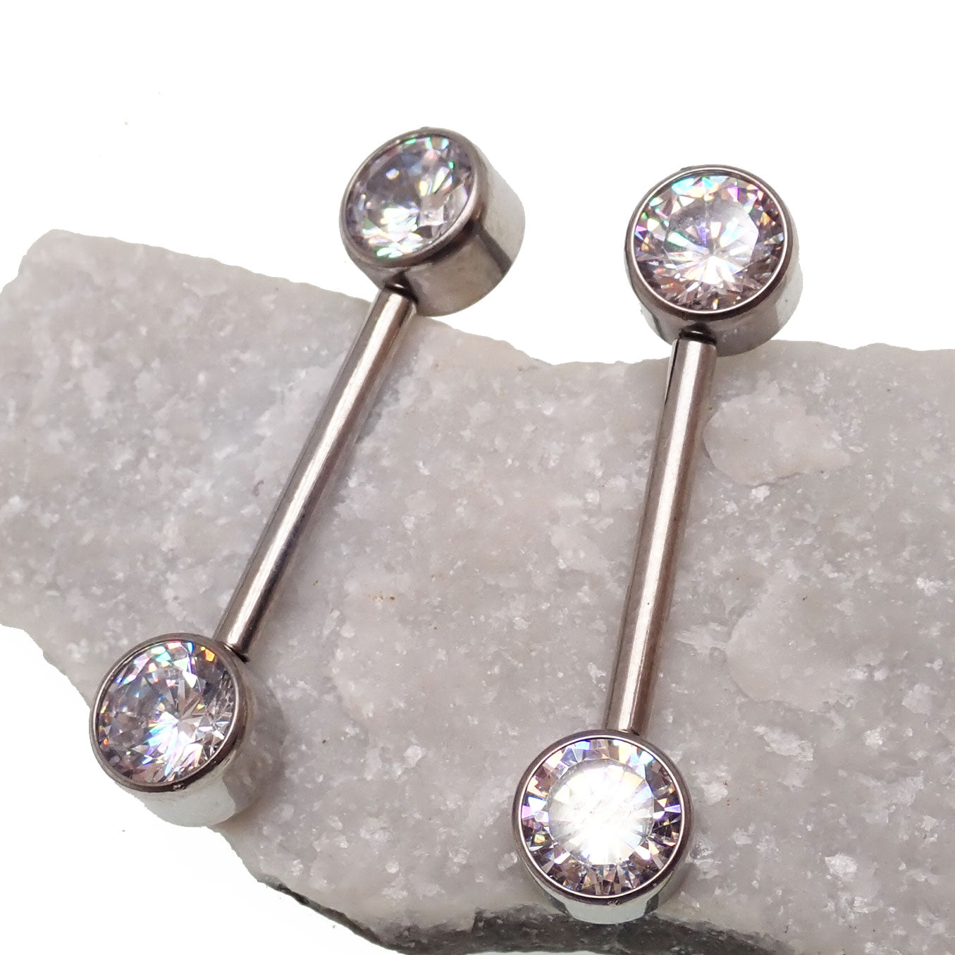 Titanium push fit nipple jewelry with CZ gemstone, 12g size, 5mm and 12mm lengths, by Body Clickers, for nipple piercing.