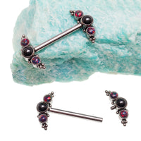 Onyx and black lava beaded nipple cluster piercing in 14g and 12g, featuring a stylish design with beaded accents.