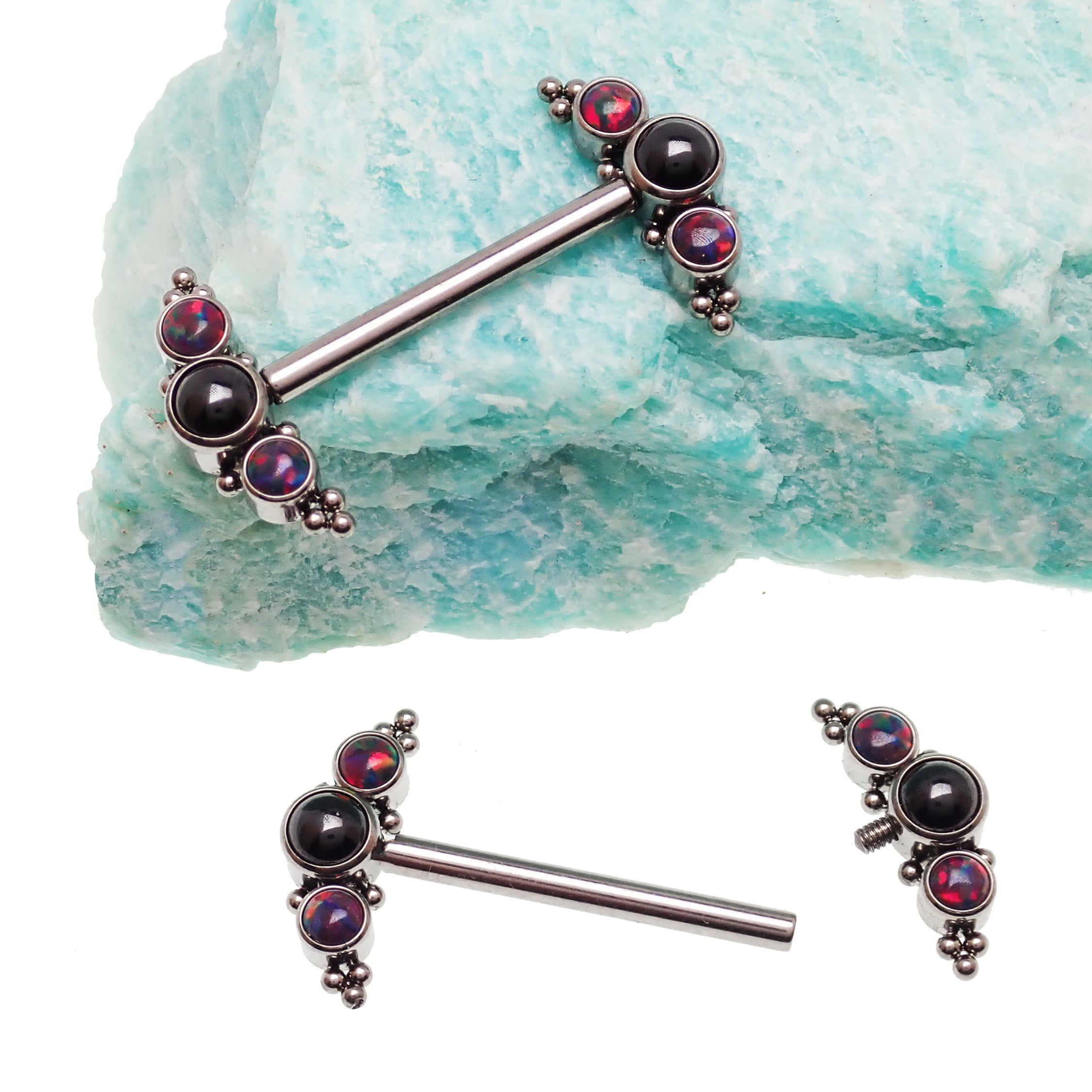 Onyx and black lava beaded nipple cluster piercing in 14g and 12g, featuring a stylish design with beaded accents.