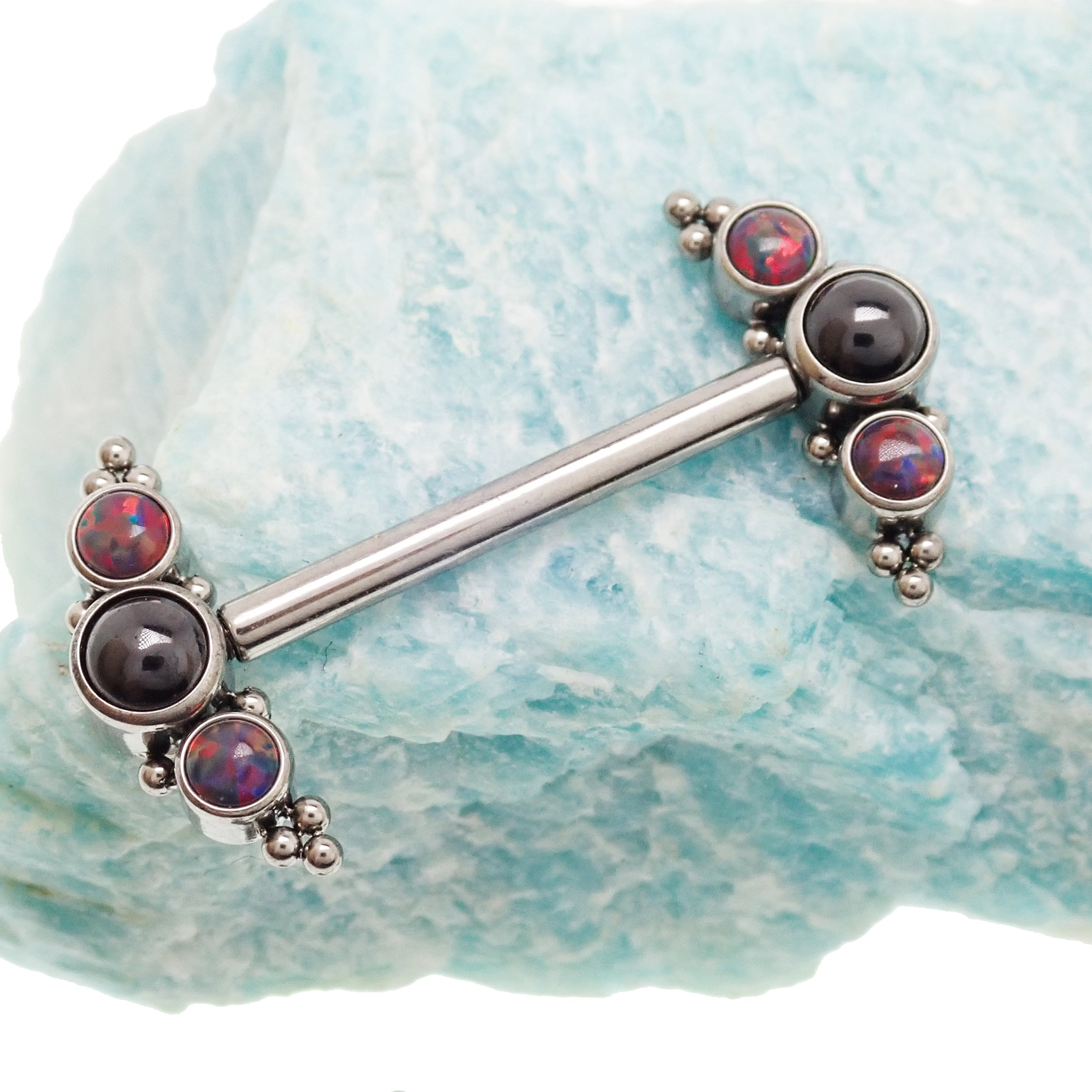 Onyx and black lava beaded nipple cluster piercing by Body Clickers, 14g and 12g, featuring a stylish beaded design.