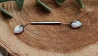 Titanium push fit nipple piercing by Body Clickers with white fire opal bullet cones on 16g, 12mm length.