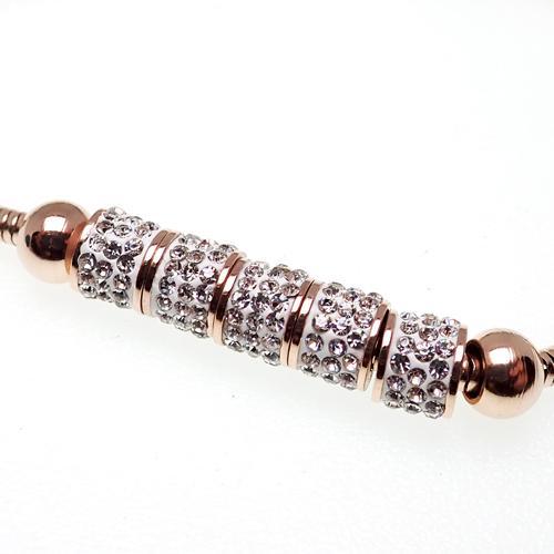 Rose gold steel multi-crystal adjustable bracelet by Body Clickers featuring sparkling stones and a sleek, modern design.