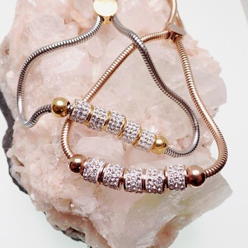 Rose gold steel multi-crystal adjustable bracelet by Body Clickers featuring multiple sparkling crystals and a sleek design