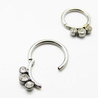 Hinged septum clicker with triple cubic zirconia stones, Body Clickers 16g jewelry for nose piercing.