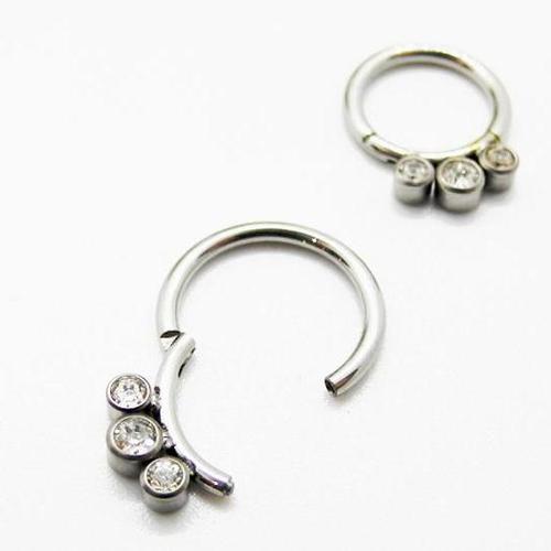 Hinged septum clicker with triple cubic zirconia stones, Body Clickers 16g jewelry for nose piercing.
