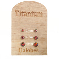 Dark cherry opal implant titanium earrings from Halobes, 20g body jewelry with 3mm size for pierced ears.