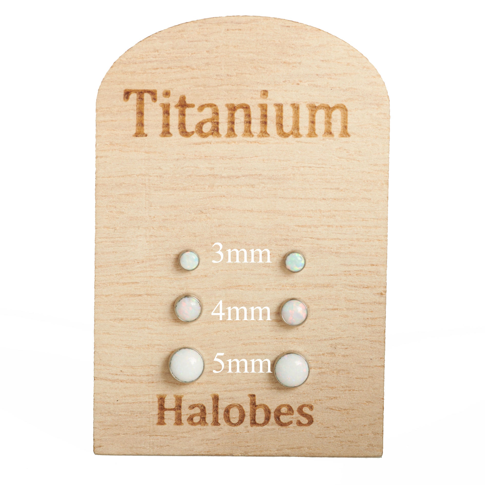 White opal implant titanium earrings in 20g body jewelry, featuring smooth, polished design by Halobes.