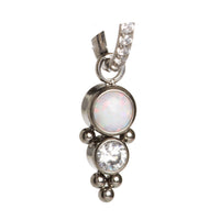 Halobes body jewelry charm featuring an opal and cubic zirconia (CZ) accents, showcasing a delicate, stylish design.