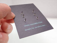 HALOBES titanium earrings with sparkling zircon crystals, featuring sleek 2.5mm hoops and a modern, elegant design.