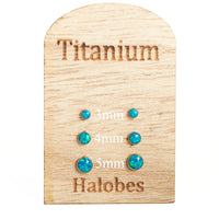 HALOBES implant titanium earrings with peacock blue opal, 20g, featuring small 3mm stone and sleek jewelry design.