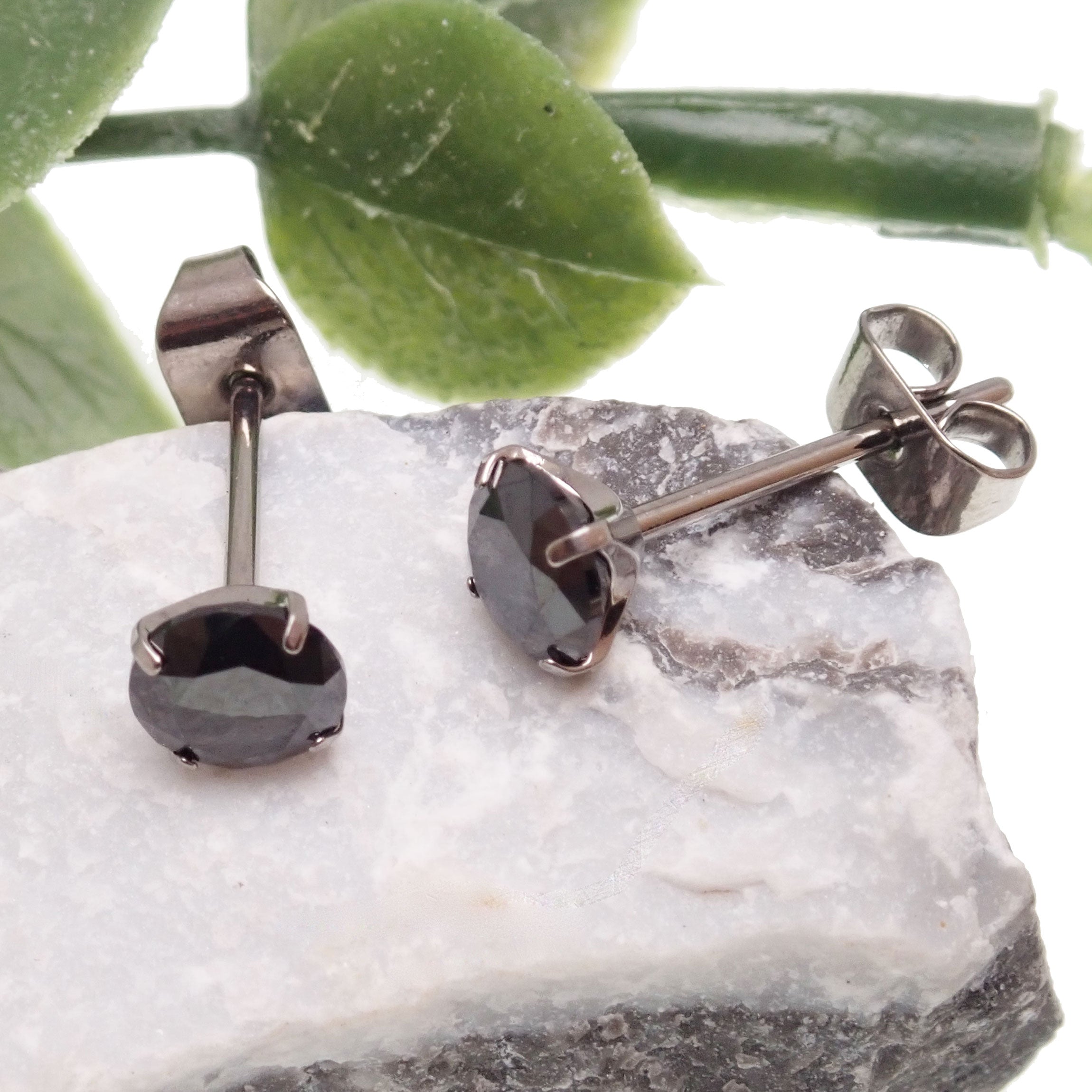 Black CZ implant titanium earrings in 20g size by Halobes, showcasing sleek, modern jewelry design with a secure post.