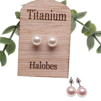 Titanium earrings by HALOBES featuring Swarovski blush pearls and sleek titanium design for elegant jewelry.