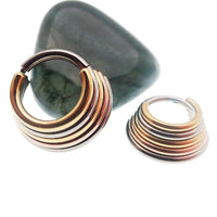 Magpie stacked trio metal titanium clicker earring in 14g or 16g with 8mm size, featuring a modern layered design.