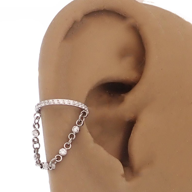 Magpie 16g hinged clicker piercing with dangle chain and cubic zirconia for elegant ear jewelry.