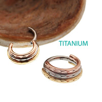 Magpie hammered trio metal septum clicker in 16g and 14g with stacked design and 8mm diameter, featuring hammered metal finish.